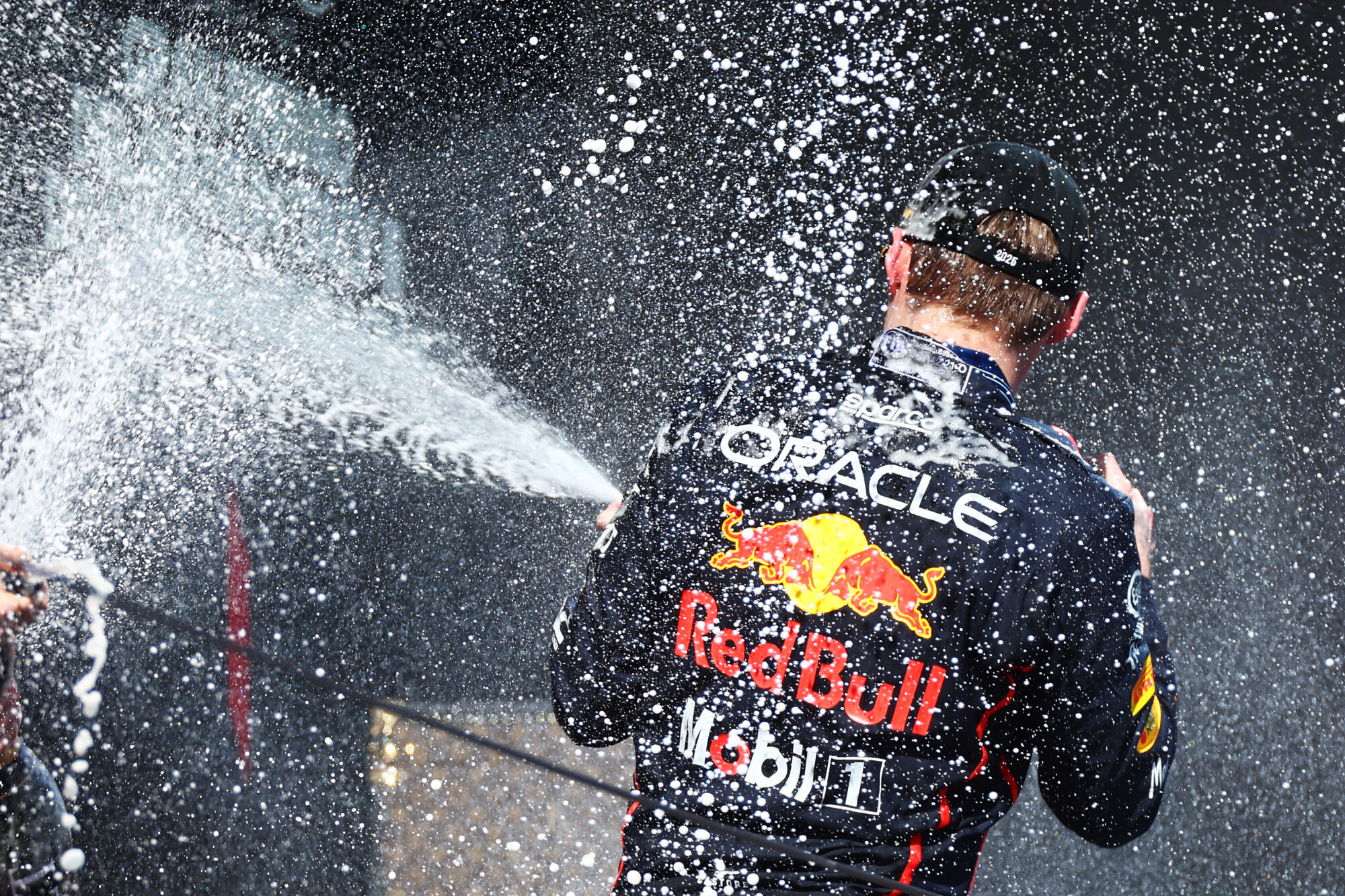 Max Verstappen podium champagne Imola 2025